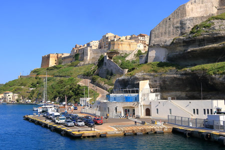 May 27 2023 - Bonifacio, Island of Corsica in France: Port of the village in afternoon lightのeditorial素材