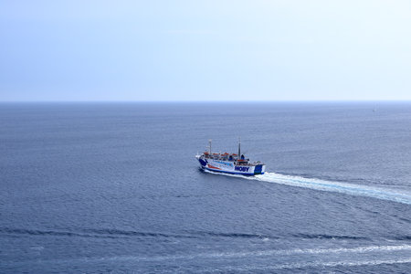May 29 2023 - Bonifacio, Corsica in France: ferry boat departing Bonifacio port for its daily cruise to Santa Teresaのeditorial素材