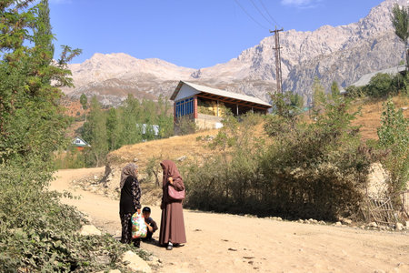 August 22 2023 - Arslanbob, Kyrgyzstan in Central Asia: houses and the everday life of the people in a small villageのeditorial素材