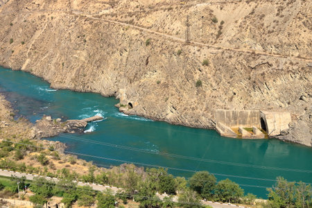 Kurpsai Hydro station. Lower Naryn River Canyon near Toktogul in Kyrgyzstan. a Hydroelectric dam in central asiaの写真素材