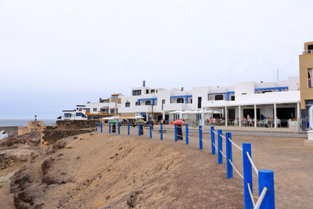 El Cotillo at Fuerteventura, Canary Islands, Spain - November 21 2023: small village at atlantic ocean on a cloudy dayのeditorial素材