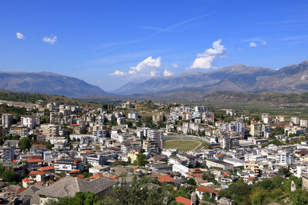 amazing view over Gjirokastra and the valley of the Drino River and surrounding mountainsの写真素材