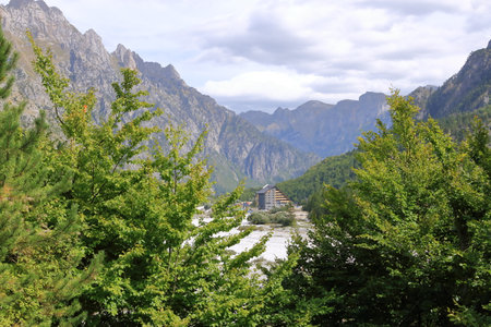 Panoramic view of raw mountain landscapes from the Albanian Alps between Theth and Valbona in Albaniaの写真素材