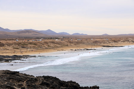 El Cotillo, Fuerteventura, Canary Islands, Spain - November 21 2023: people enjoy the stunning view...