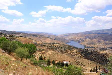 Jerash, Jordan - view over the Zarqa river and the King Talal Damの写真素材
