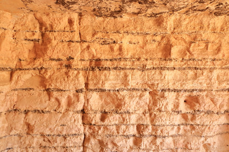 a red orange natural stone wall background