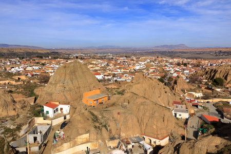 Aerial view of the Barrio de Cuevas in Guadix, cave-houses in Andalucia from Mirador del Cerro de la Bala, Spainの写真素材