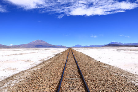 Railroad tracks in the salar de Chiguana, Potosi department in Boliviaの写真素材