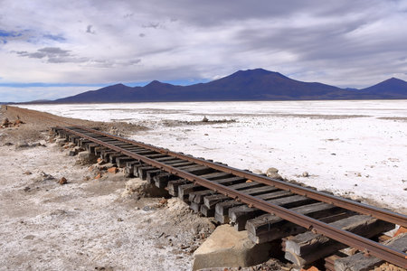 Railroad tracks in the salar de Chiguana, Potosi department in Boliviaの写真素材