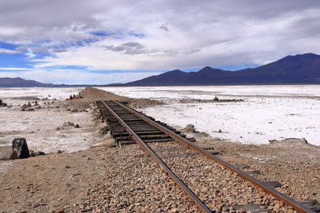 Railroad tracks in the salar de Chiguana, Potosi department in Boliviaの写真素材