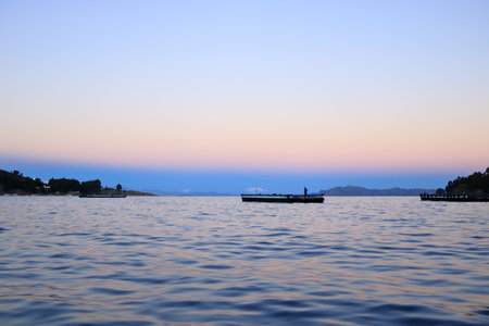 the landscape around the Strait of Tiquina on the Titicaca lake, San Pablo de Tiquina, Boliviaの写真素材