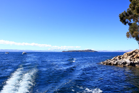 a view to Moon Island (Isla de la Luna) on Lake Titicaca in Boliviaの写真素材