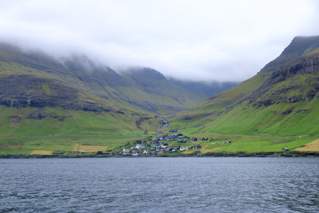 Bour village near Sorvagur at Vagar island, Faroe, Denmark in Europeの写真素材