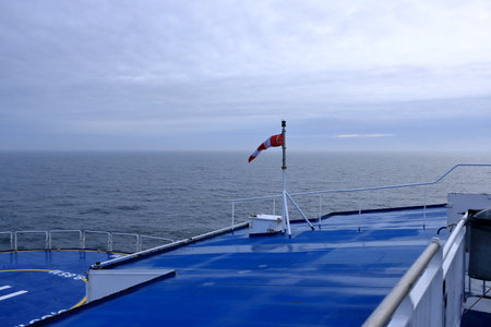 the seascape of the ocean - waves and sky with clouds in lightingの写真素材