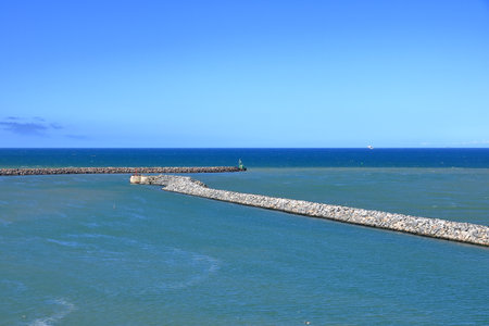 Hirtshals in Denmark - September 06 2025: a ship is leaving the port of the villageのeditorial素材