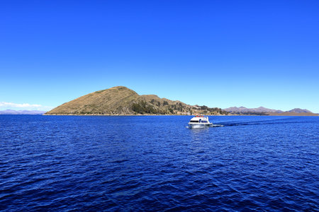Lake Titicaca in Bolivia - May 31 2025: boat on a tour over the lake on a sunny dayのeditorial素材