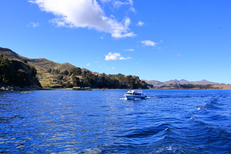 Lake Titicaca in Bolivia - May 31 2025: boat on a tour over the lake on a sunny dayのeditorial素材