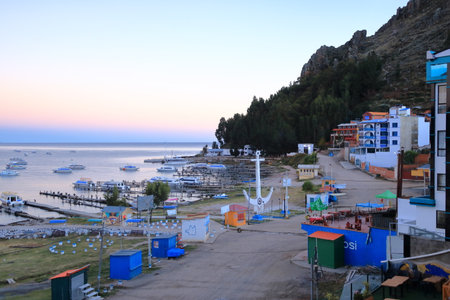 Copacabana in Bolivia - May 31 2025: boats mooring in the bay of the village at the Lake Titicacaのeditorial素材