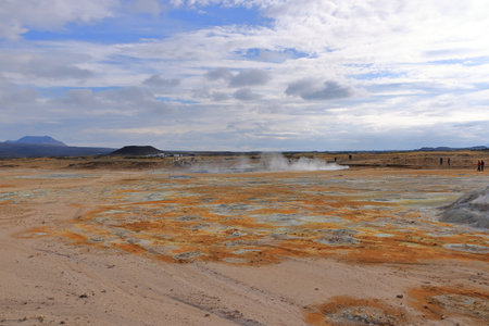 Hverir in Iceland - August 29 2025: people enjoy the geothermal area with boiling mudpools and steaming fumaroles, also known as Hverarondのeditorial素材