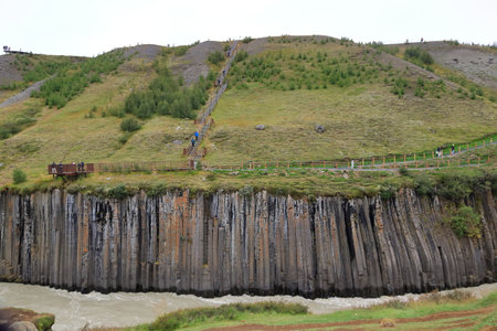 Studlagil Canyon in Iceland - August 28 2025: people enjoy the canyon on a cloudy dayのeditorial素材