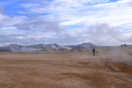 Hverir in Iceland - August 29 2025: people enjoy the geothermal area with boiling mudpools and steaming fumaroles, also known as Hverarondのeditorial素材