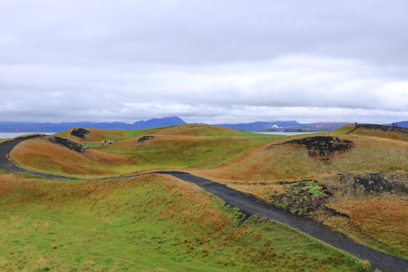 Skutustadir, lake Myvatn, Iceland - August 30 2025: people enjoy the Pseudo craters, volcanoes and geothermal areasのeditorial素材