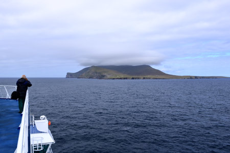 Shetland islands in Scotland - August 24 2025: people approach to the island by boat