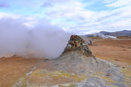 Hverir in Iceland - August 29 2025: people enjoy the geothermal area with boiling mudpools and steaming fumaroles, also known as Hverarondのeditorial素材