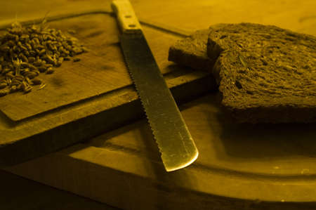Cereal products, bread cut with a knifeの写真素材