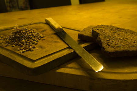 Cereal products, bread cut with a knifeの写真素材