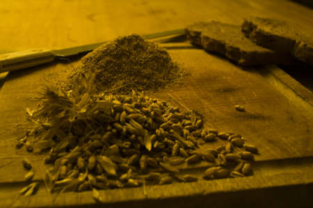 Cereal products, bread cut with a knifeの写真素材