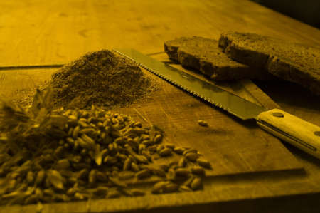 Cereal products, bread cut with a knifeの写真素材