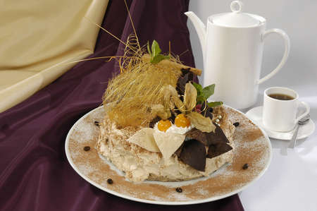 luxorious coffee cake and cup of coffeeの写真素材