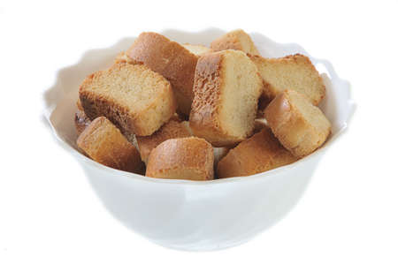 The sliced rusk in plate isolated on white backgroundの写真素材