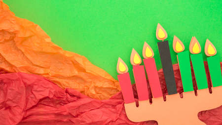 Happy Kwanzaa Greeting Card Background. Candleholder made from paper leaves. Paper art concept, Banner mockupの写真素材