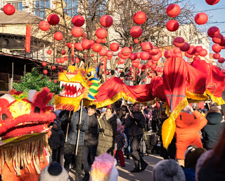 Dnipro, Ukraine - 02 05 2022: Chinese dragon dance on the street of a European city in celebration of the Chinese New Year or Lunar New Yearのeditorial素材