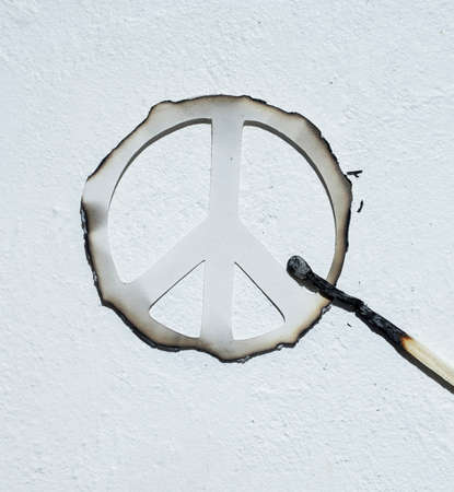 concept protect the world, burnt pacific and match, anti war background