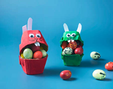 EASTER BUNNIES from an egg carton WITH SWEET GIFTS, Easter crafts with childrenの写真素材
