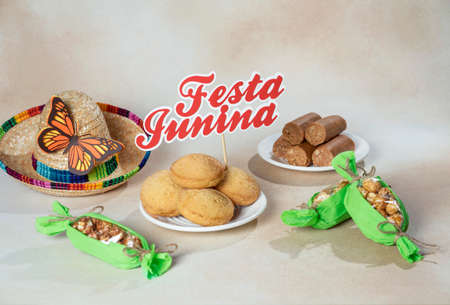 June party table Typical Brazilian feast of June. Contains peanut sweets, cookies, popcorn corn on...
