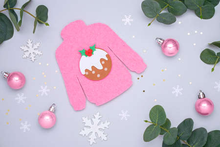 Pink Christmas sweater,  Christmas jumper day compositionの写真素材