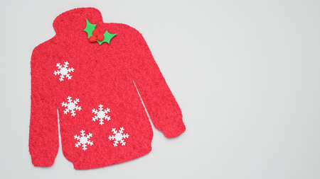 Red and white Christmas sweater,  Christmas jumper day composition, banner format