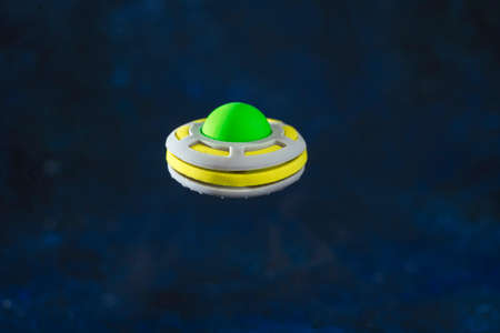 Space travel concept, UFO on dark backgroundの写真素材