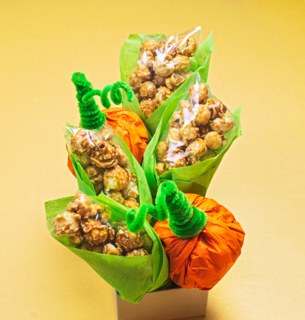 treats for kids packaged in the shape of pumpkin and corn on the cob for Halloween or Kwanzaaの写真素材