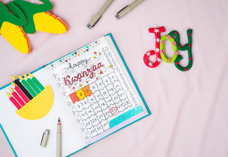 Homemade bullet journal  with kwanzaa calendarの写真素材