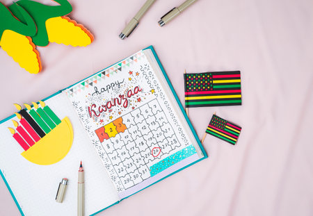 Homemade bullet journal  with kwanzaa calendarの写真素材