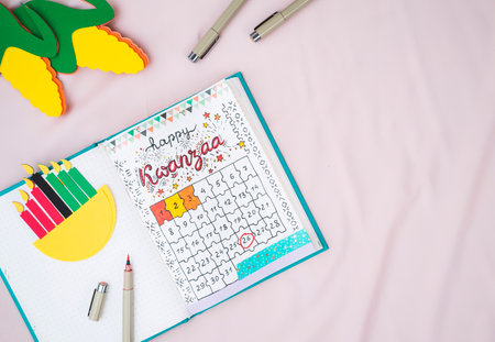 Homemade bullet journal  with kwanzaa calendarの写真素材