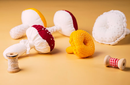 mushrooms sewn from cotton fabric. stuffed toys in the shape of a mushroomの写真素材