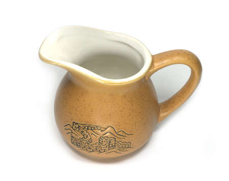 Brown empty milk jug can with picture isolated on whiteの写真素材