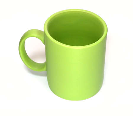 Light green empty tea cup isolated on whiteの写真素材