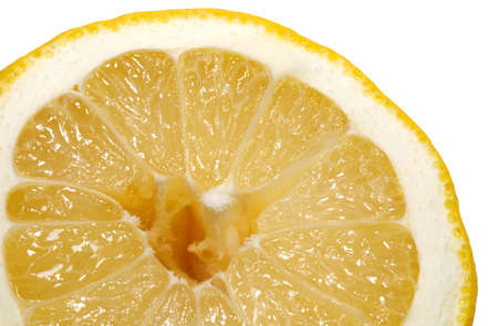 Part of ripe lemon section isolation on white closeupの写真素材
